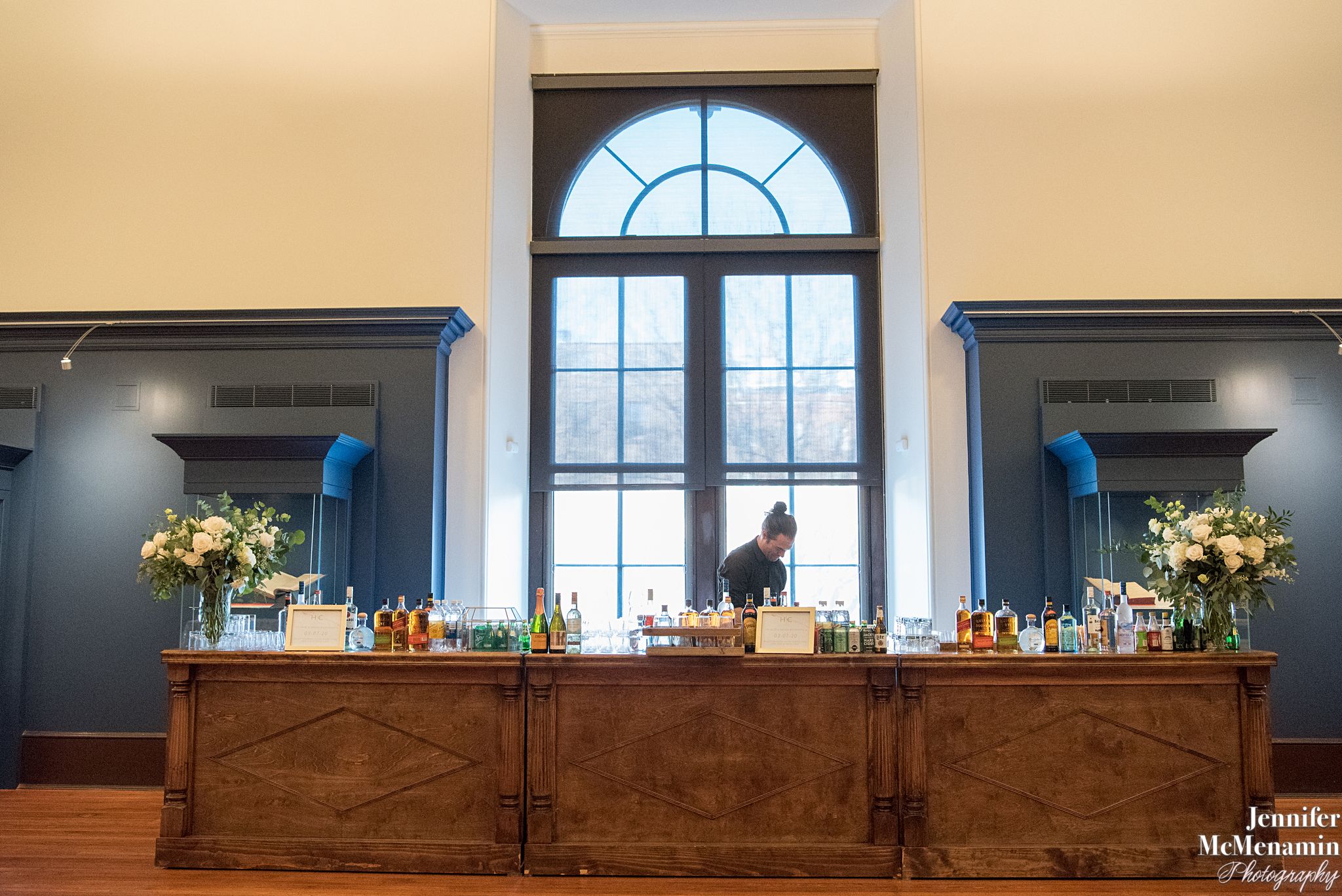 wooden bar set up in exhibit gallery