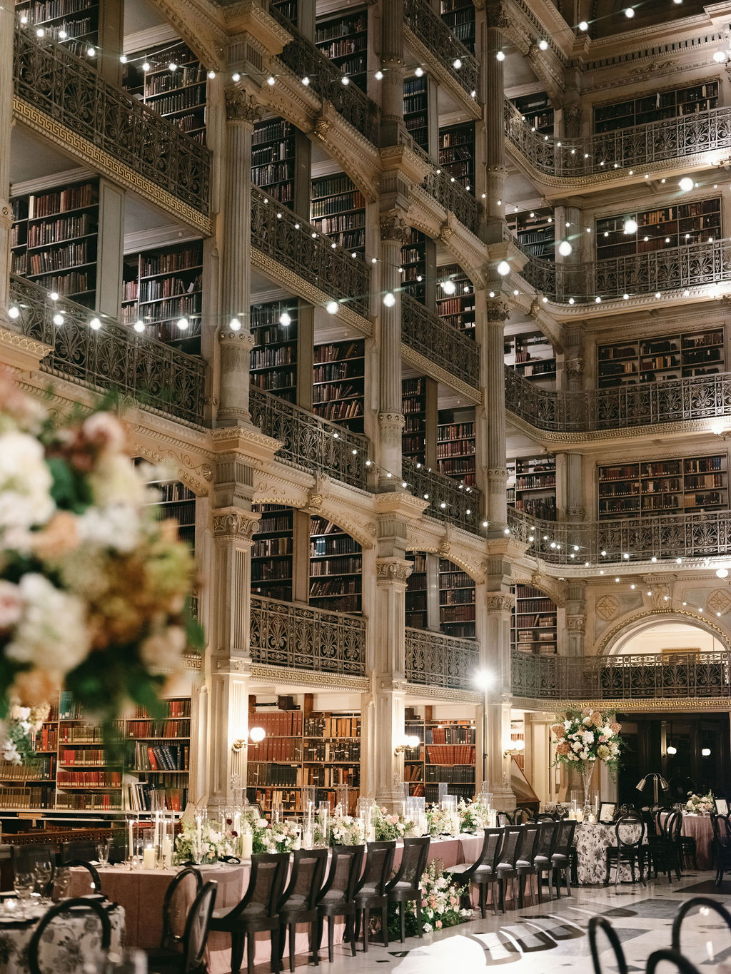 Madeline-Serio-Photography_Mollie-Sam_10-26-24 (40) The library decorated with lights for a wedding.