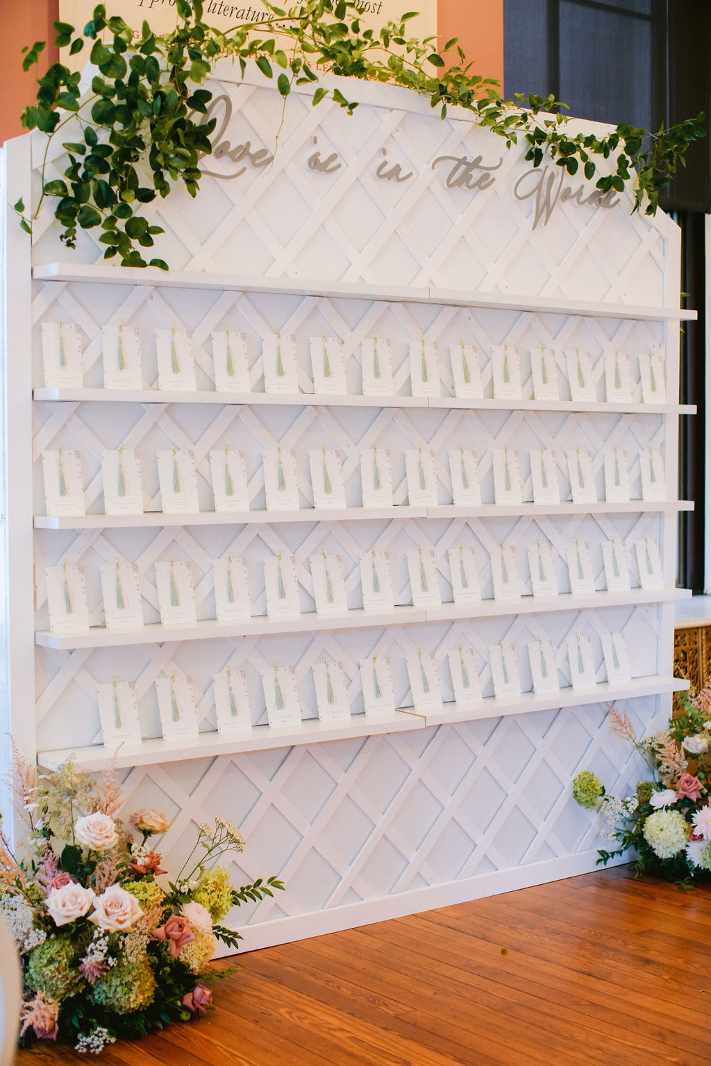 NikkiSanterre Photography_Emily&Daniel_9-1-24 (24) Seating chart in the exhibit gallery.