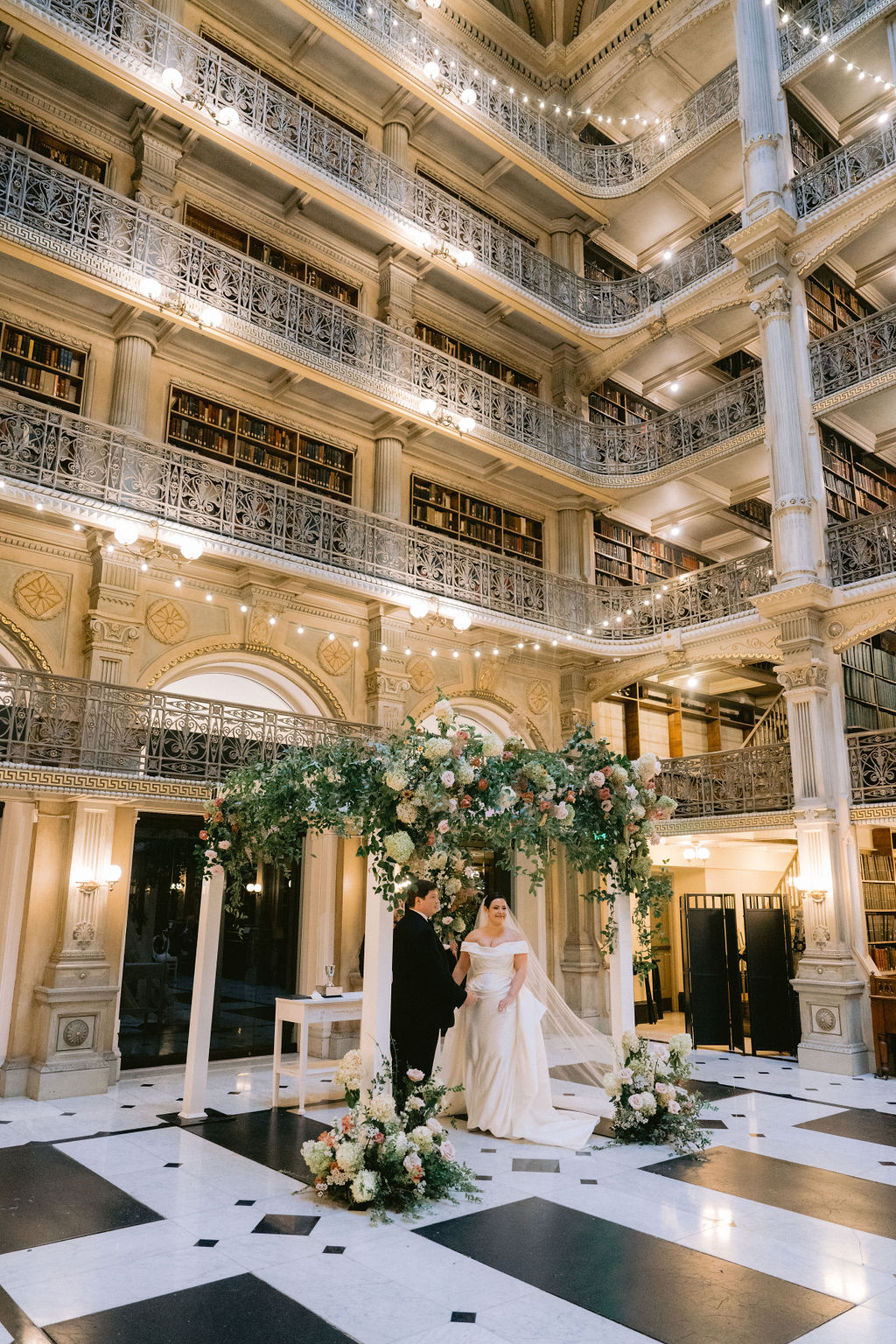 NikkiSanterre Photography_Emily&Daniel_9-1-24 (26) Bride underneath a chuppah in the library.