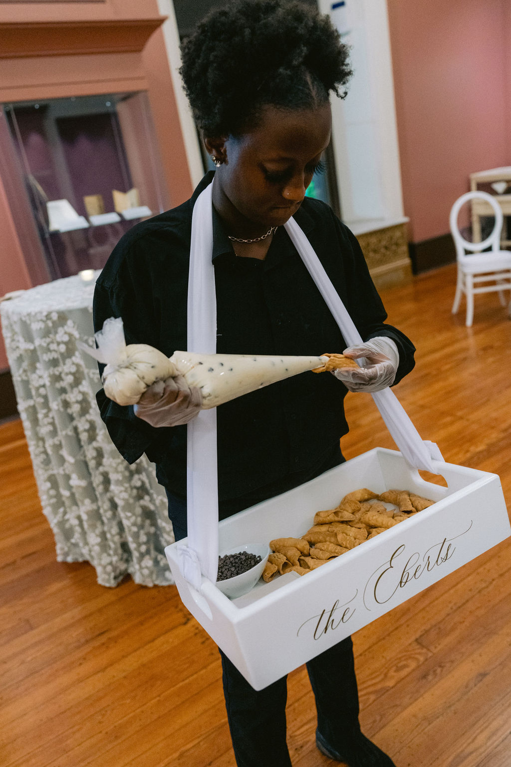 NikkiSanterre Photography_Emily&Daniel_9-1-24 (87) Mobile cannoli station in the exhibit gallery.